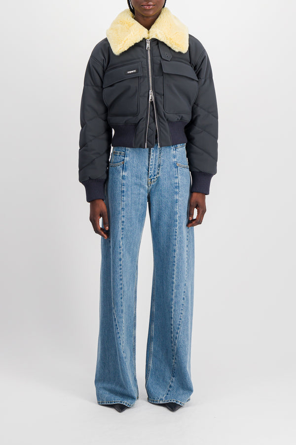 Extra wide leg blue denim jeans with cut-out belt